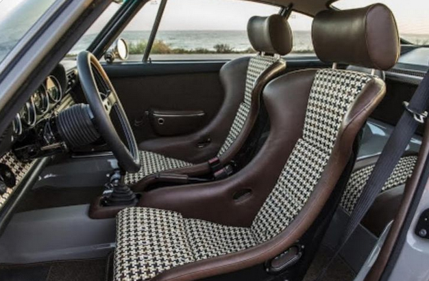 Illustration only, current specification is red/burgendy leather seats with complimenting duotone fabric houndstooth design.